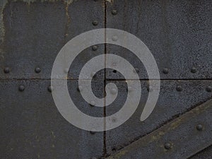 Rusted metal texture with rivets