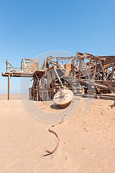 Rusted oil drilling rig between Henties Bay and Torra Bay