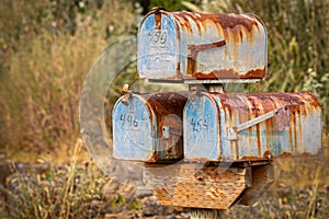 rusted old US Mail boxes