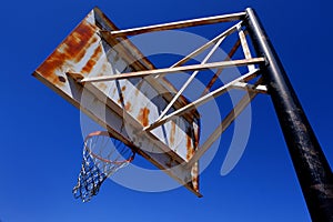 Rusted Rusty Old Basketball Hoop Outside Blue Sky