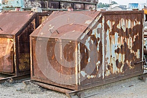 Rusted scrap containers