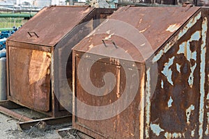 Rusted scrap containers