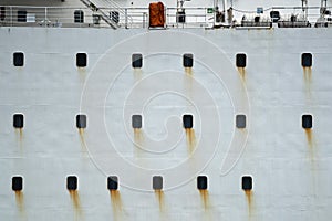 Rusted ship portholes