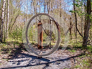 Rusted Steel Gong Art on Elkin & Alleghany Trail