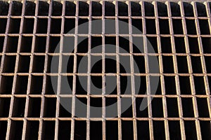 Rusted steel grid grate background pattern