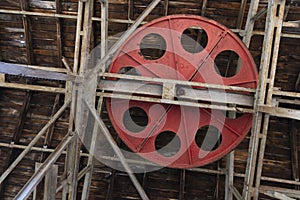 Rusted steel roller wheel abandoned industrial equipment from coal mining