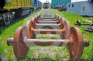 Rusted Train Wheels on Rail Tracks.