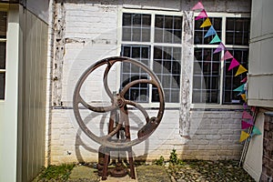 Rusted wheel New inn at stowe gardens national trust england