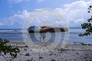 Rusted wrecked ship on the beach