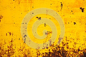 Rusted yellow painted metal. Abstract texture matal background.