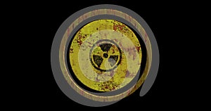 Rusted yellow painted metal radioactive sign spinning. Loop animation