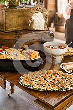 Rustic Appetizer Display with Cheese, Bread, and Crackers