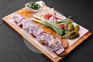 Rustic appetizer for vodka on wooden board