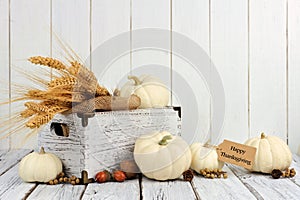 Rustic autumn decor against white wood photo