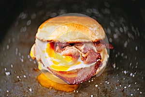 Rustic bacon egg breakfast sandwich bun