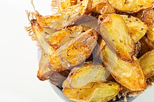 rustic baked (Batata Rústica) potato, with aromatic herbs,