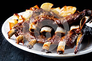 Rustic barbequed pork ribs