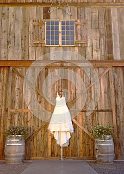 Rustic barn door window floral wedding white dress