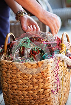 Rustic basket filled with colored wools