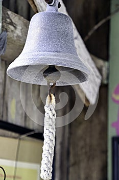 Rustic Bell with rope closeup