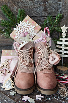 Rustic boots with christmas presents