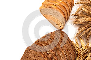 Rustic bread. Fresh loaf of rustic traditional bread with wheat grain ear or spike plant isolated on white background. Rye bakery