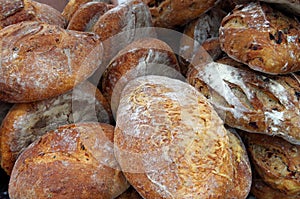 Rustic bread loaves piled for market