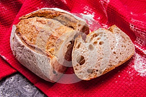 Rustic bread with red kitchen Towels. Country house style. Authentically