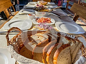 Rustic breakfast at the campsite for several tourists