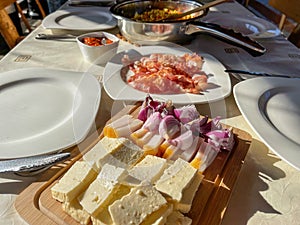 Rustic breakfast at the campsite for several tourists