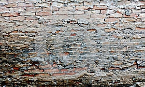 Rustic Brick Wall with peeling paint background texture.