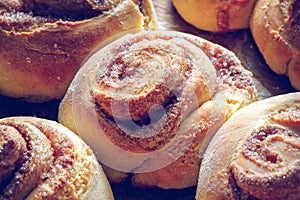 Rustic buns of sweet milk and cinnamon. Gastronomic concept