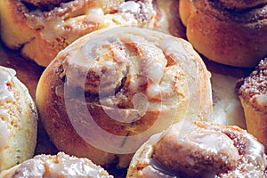 Rustic buns of sweet milk and cinnamon. Gastronomic concept