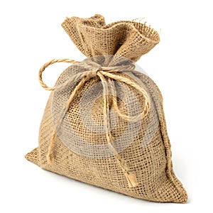 Rustic burlap sack tied with twine isolated on white background photo