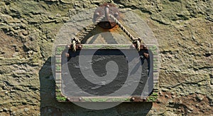 Rustic chalkboard hanging on a textured wall displaying a blank message space