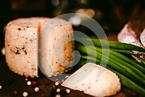 Rustic cheese with herbs, pepper and leek