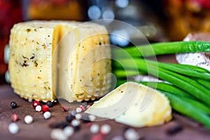 Rustic cheese with herbs, pepper and leek