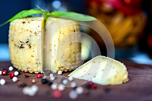 Rustic cheese with herbs and peppercorn