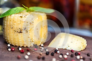 Rustic cheese with herbs and peppercorn