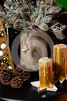 Rustic Christmas Decor with Candles and Pine Cones