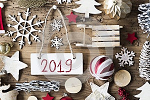 Rustic Christmas Flat Lay With Ornament, Text 2019