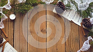 Rustic Christmas Flatlay of Pine Cones, Sheet Music, and Evergreen Boughs