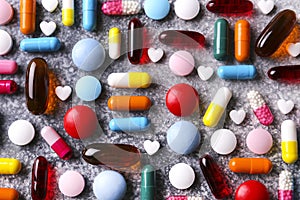 Rustic composition with multiple pills laid out in a pattern