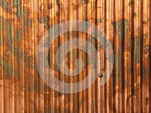 Rustic corrugated metal copper industrial background with brown grungy colors photo