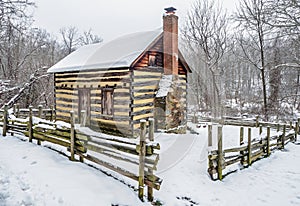 Rustic country pioneer house in the snow