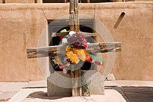 Rustic cross with flowers