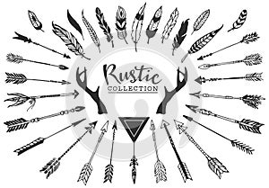 Rustic decorative antlers, arrows and feathers. Hand drawn vintage vector design set. photo