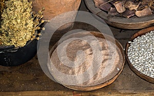 Rustic display of beans and grains on wooden bowls