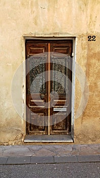 Rustic door in an ancient house and town