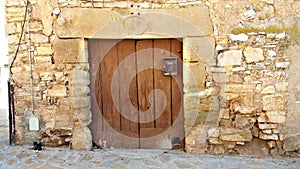 Rustic door in an ancient house and town